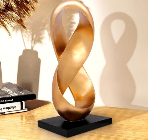 Abstrakte vergoldete Skulptur aus Kunstharz 38 cm