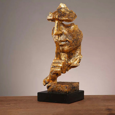 Manngesichtsstatue<br> Schweigen ist Gold