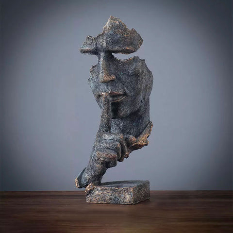 Manngesichtsstatue<br> Schweigen ist Gold