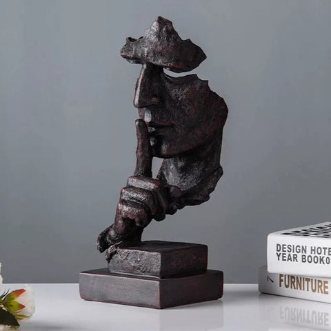 Manngesichtsstatue<br> Schweigen ist Gold