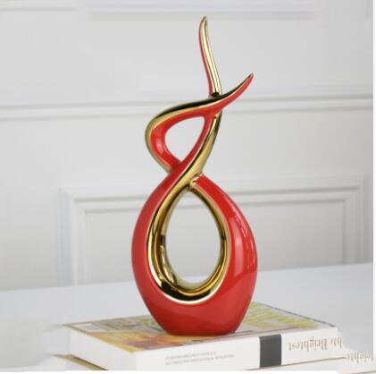 Abstrakte Skulptur<br> Goldene Umarmung