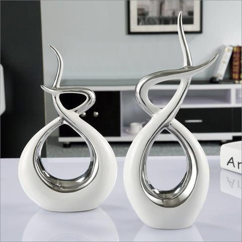 Abstrakte Skulptur<br> Goldene Umarmung