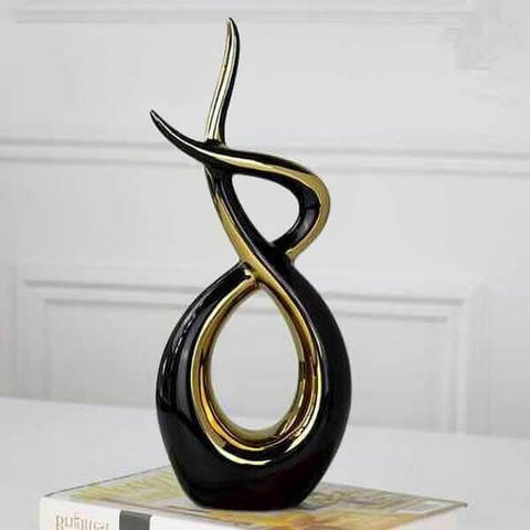 Abstrakte Skulptur<br> Goldene Umarmung