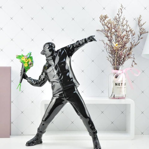 statue banksy flower bomber
