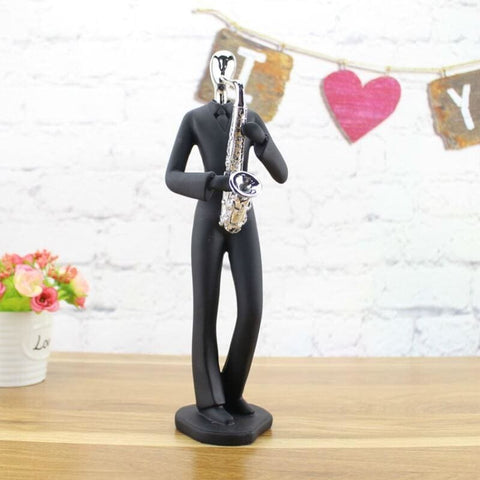 Mannstatue<br> Gruppe von Musikern