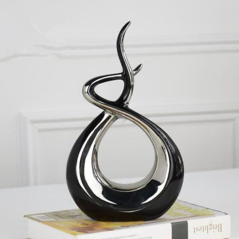 Abstrakte Skulptur<br> Goldene Umarmung